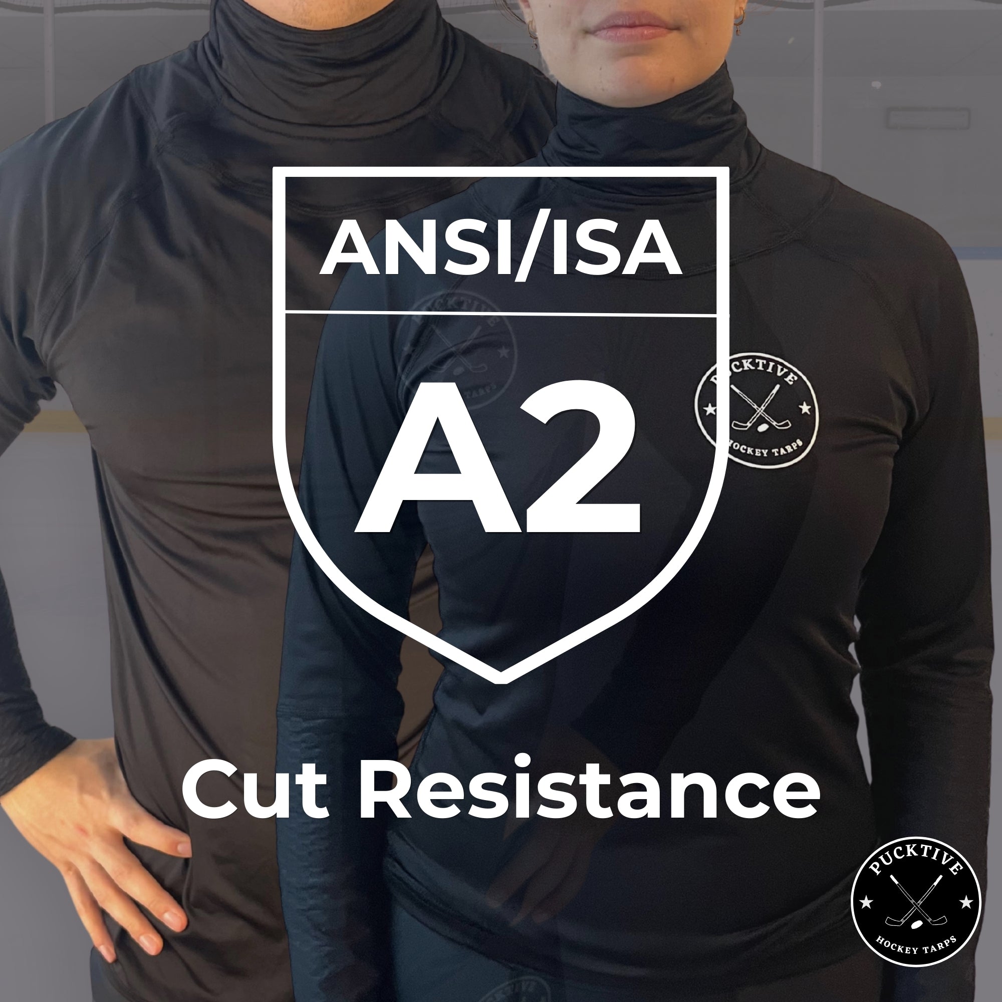 Two people wearing black high-visibility clothing with ANSI/ISA A2 cut resistance label.