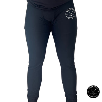 Front view of boy’s dry fit hockey leggings showing athletic fit and breathable performance fabric.