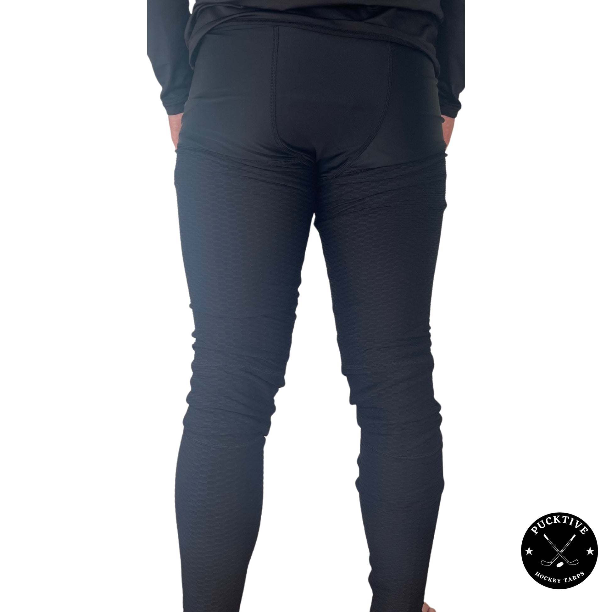 Rear view of Boy’s Elite A9 cut-resistant goalie leggings highlighting femoral artery, calf, and Achilles protection coverage.