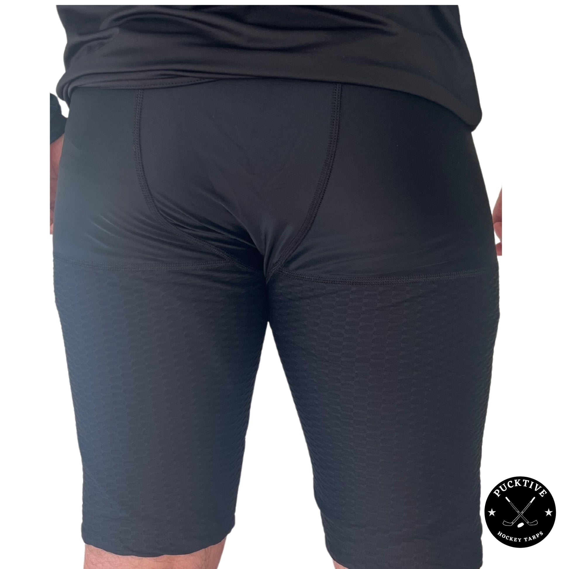 Rear view of Boy’s Pro A7 cut-resistant hockey shorts showing thigh and hamstring protection zones.