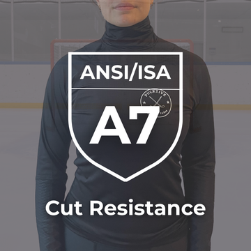 Person wearing a black long-sleeve shirt with ANSI/ISA A7 cut resistance logo.
