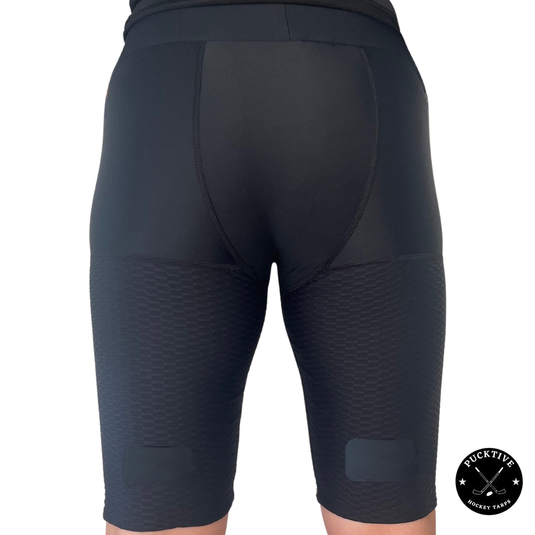 Front view of Girl’s Pro A7 cut-resistant hockey jill shorts with built-in cup pocket and Velcro sock tabs.