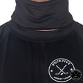 Male hockey player wearing black Pucktive cut-resistant neck guard.