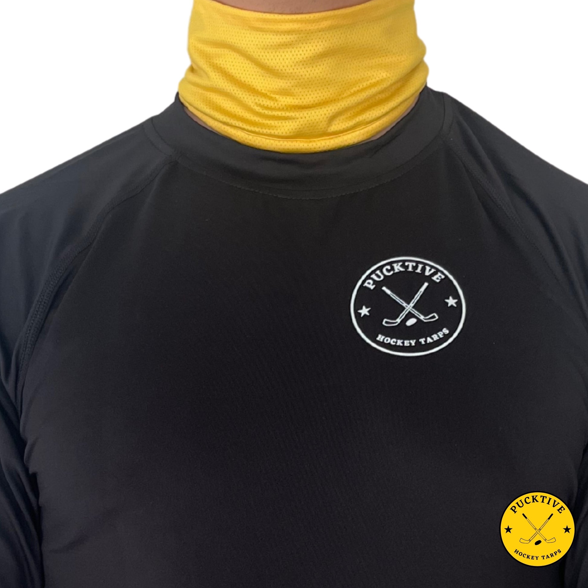 Male hockey player wearing yellow Pucktive cut-resistant neck guard.