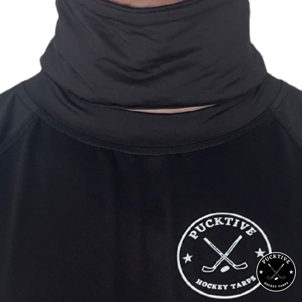 Male hockey player wearing black Pucktive cut-resistant neck guard.