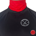 Male hockey player wearing red Pucktive cut-resistant neck guard.