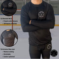 Cut protection info page for the Men’s Elite A9 wrist-only cut-resistant hockey shirt showing wrist coverage zones.