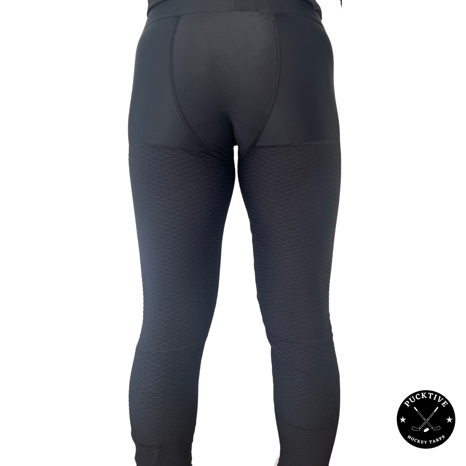 Rear view of Women’s Base A2 cut-resistant goalie leggings highlighting femoral artery, calf, and Achilles protection coverage.