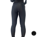 Back view of women’s dry fit hockey leggings showing ergonomic stretch panels and moisture-wicking fabric design.
