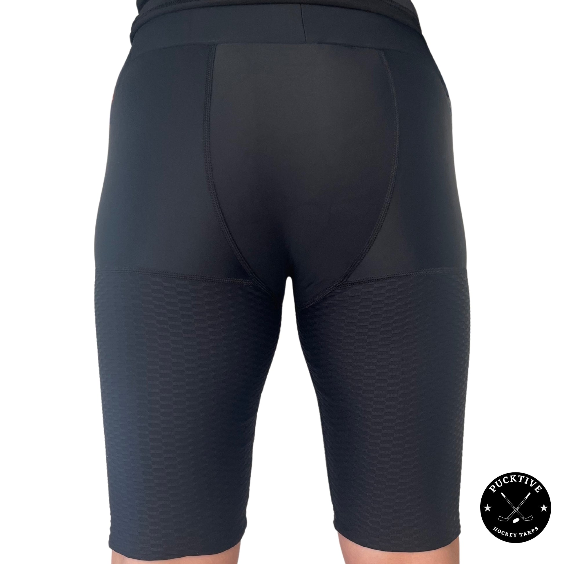 Rear view of Women’s Pro A7 cut-resistant hockey shorts showing thigh and hamstring protection zones.